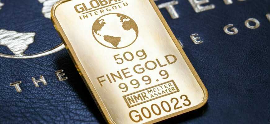 Detailed image of gold bar labeled Global Intergold on textured surface.